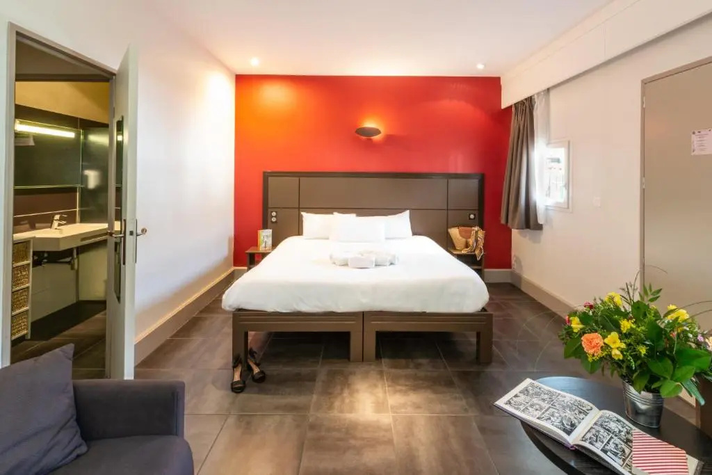Hôtel Grand Confort Le Moulin Rouge - Chambres