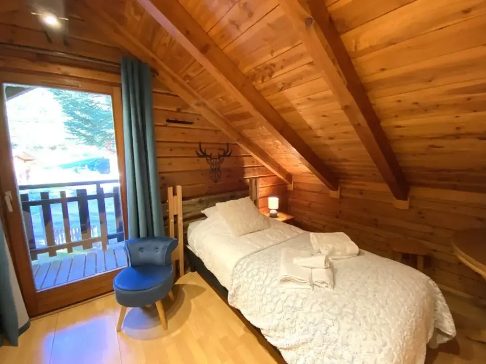 Voir la photo 4 — LE Renne Chalet en Bois au Calme Avec SPA Jacuzzi