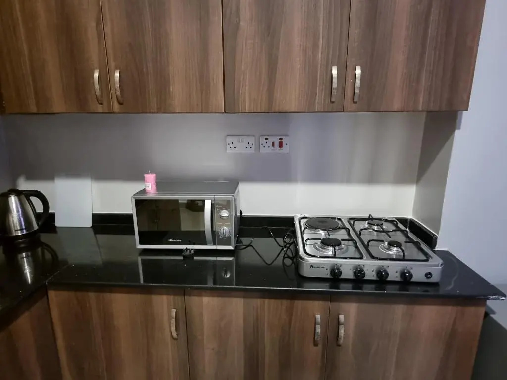 Kampala Suites - Chambres
