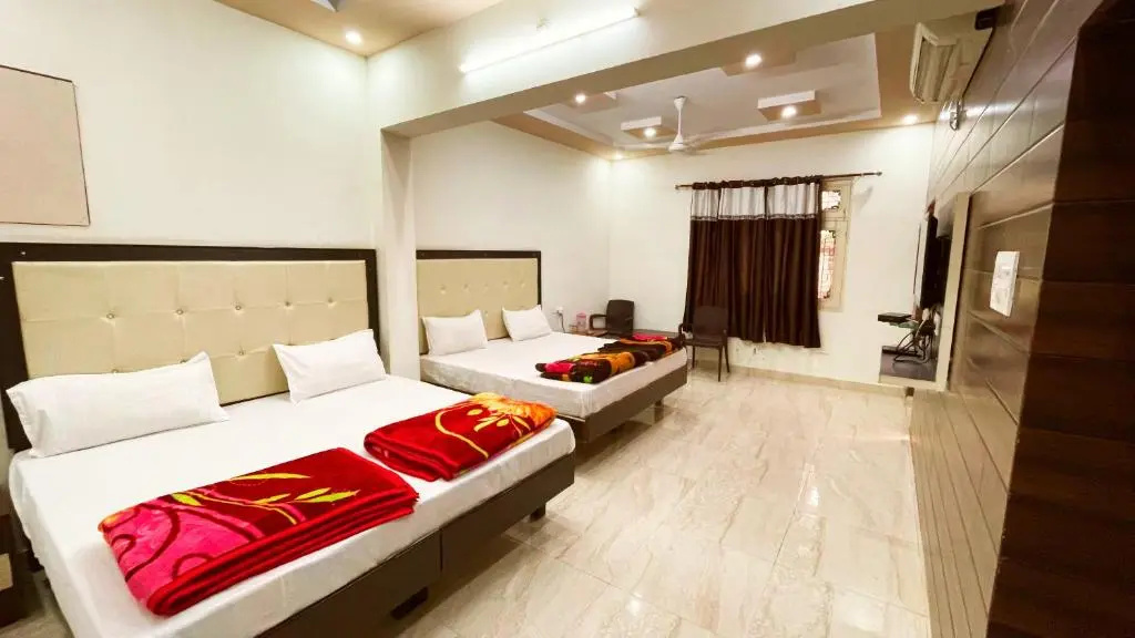 Standard Quadruple room with garden view