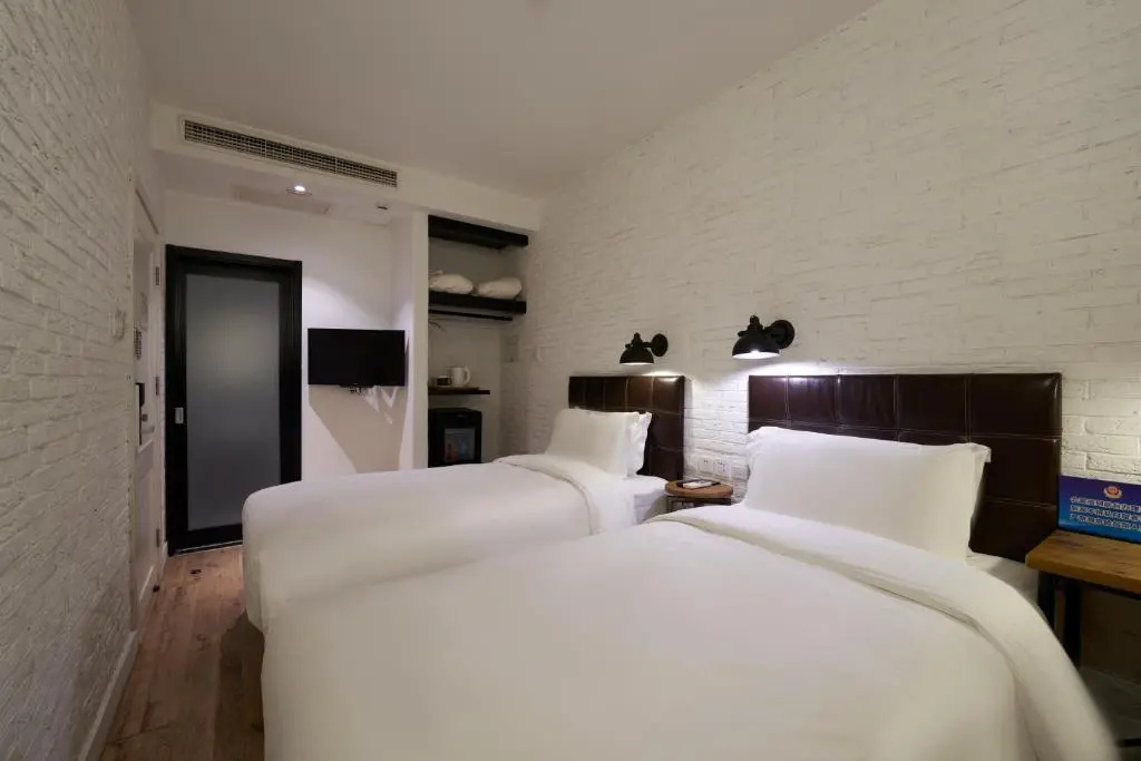 Yi Stack Hotel - Chambres