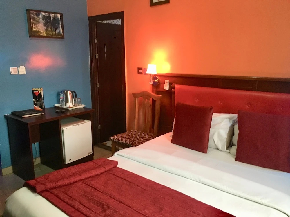 Definite Destiny Hotel - Chambres