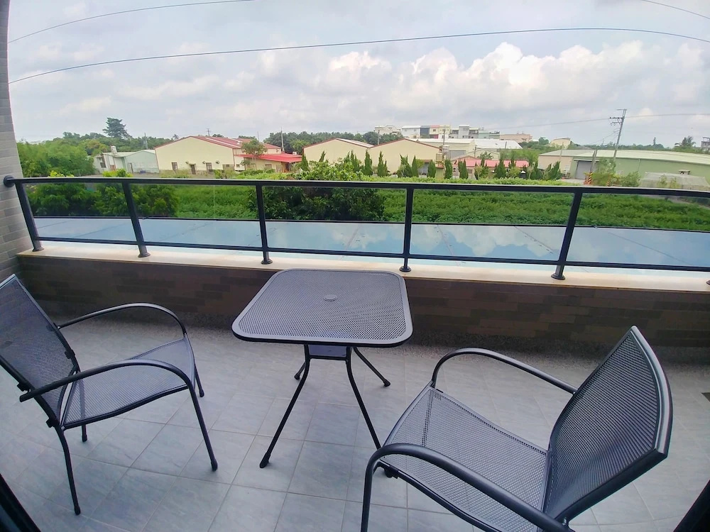 Deluxe Quadruple room with balcony