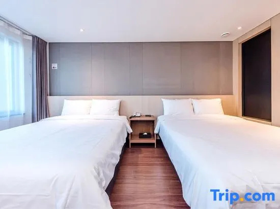 Noblepia Hotel - Chambres