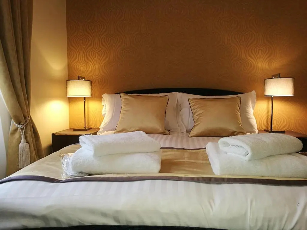 The Devon Court - Chambres