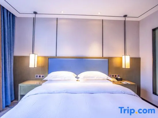 Shihe Hotel Xinyang - Chambres
