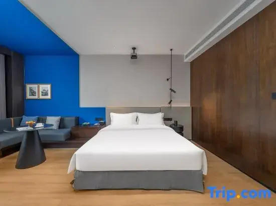 Kunlong Hotel - Chambres