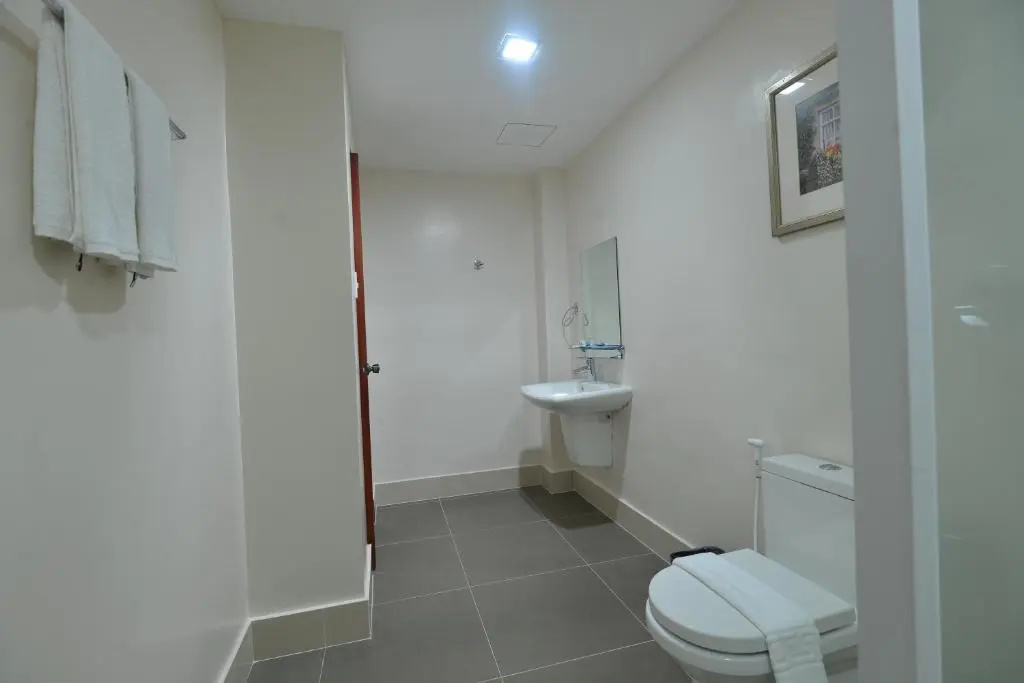 Royal Suites Condotel - Chambres