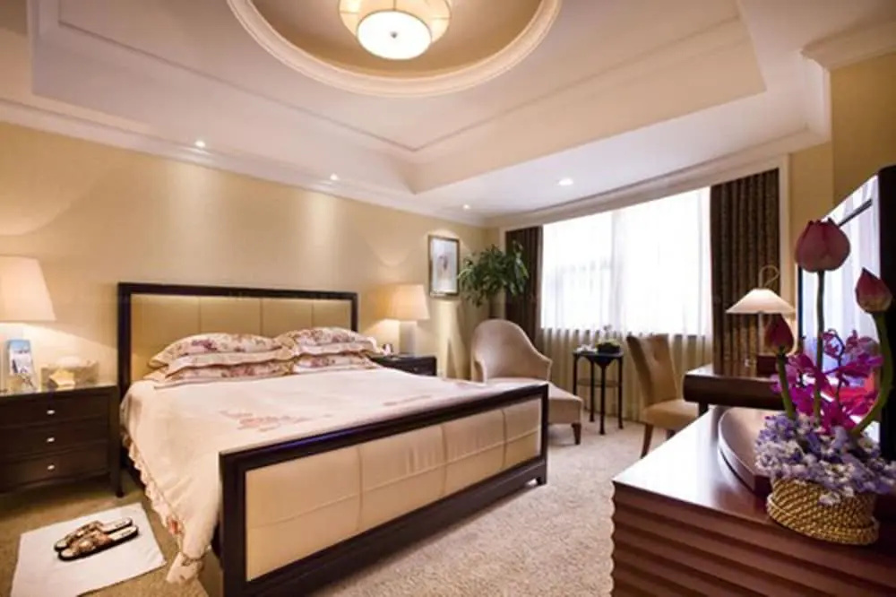 Huachen International Hotel - Chambres