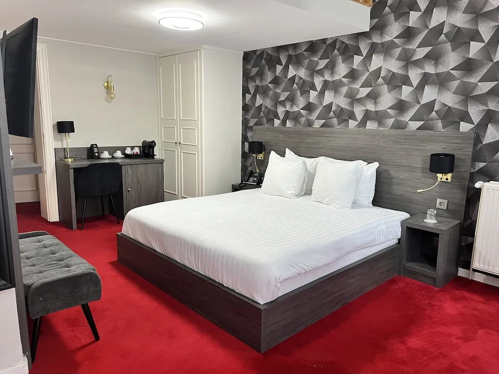 Deluxe Quadruple room with balcony