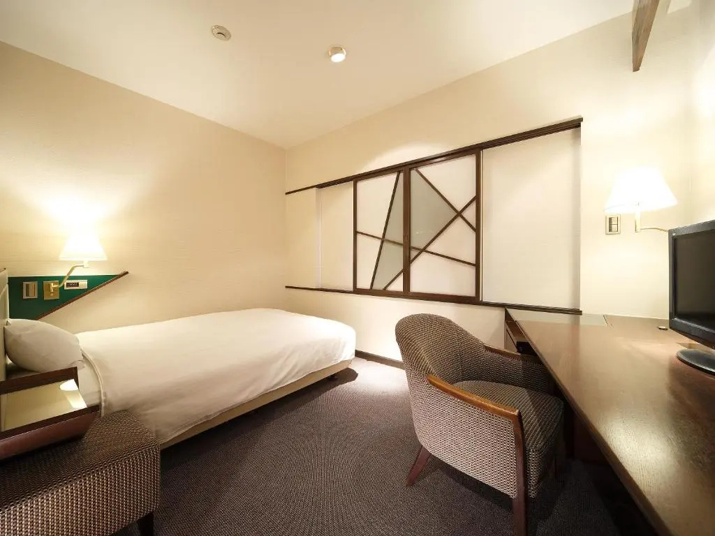 Hotel New Omi - Chambres