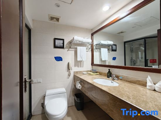 Xinli Hotel - Chambres