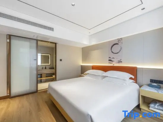 Xinyue Hotel - Chambres