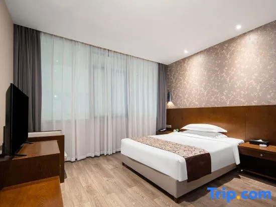 Xinhua Hotel - Chambres