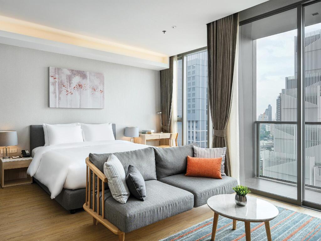 Двухместная студия Deluxe с 2 комнатами 2 отдельные кровати в Oakwood Suites Bangkok