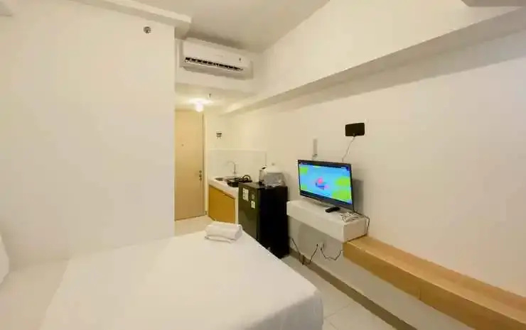 Homey and Modern Furnished Studio Tokyo Riverside PIK 2 Apartment By Travelio