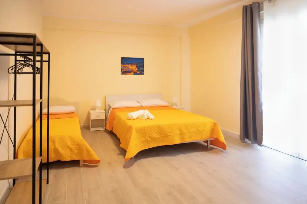 Standard Quadruple room with balcony and with garden view