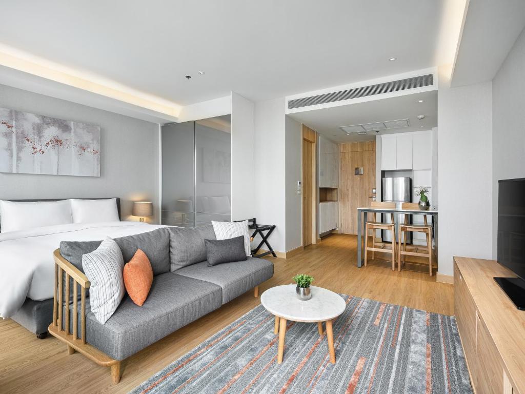 Двухместная студия Deluxe с 2 комнатами 2 отдельные кровати в Oakwood Suites Bangkok