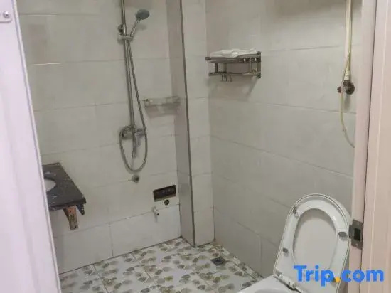 Jin Tai Hotel - Chambres