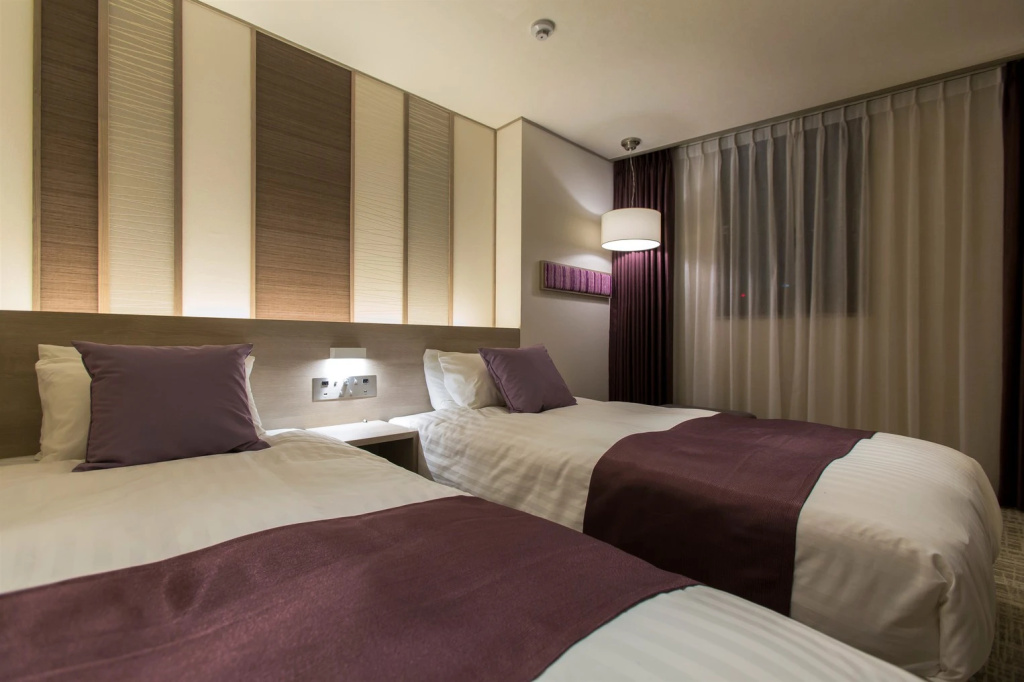 Kita Hotel - Chambres