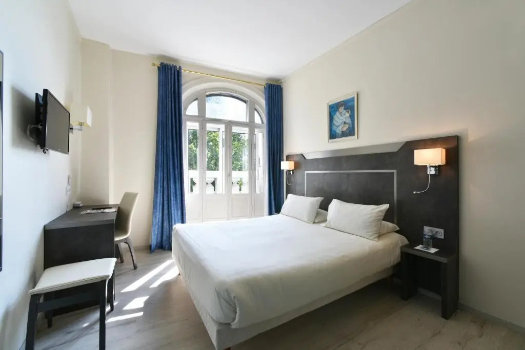 Hôtel Moderne - Chambres
