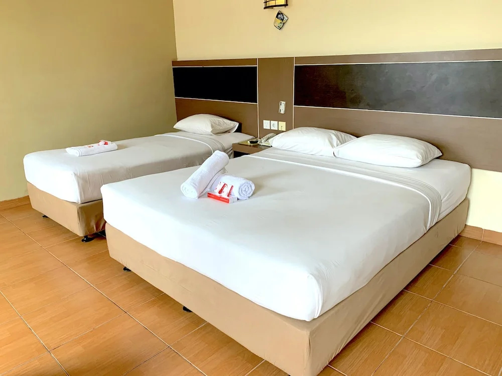 Parma Indah Hotel - Chambres