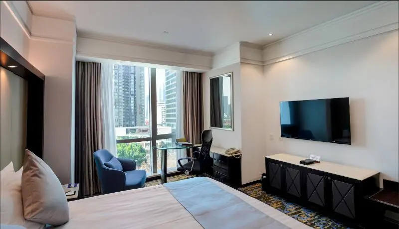 Howard Johnson Huaihai Hotel Shanghai - Chambres