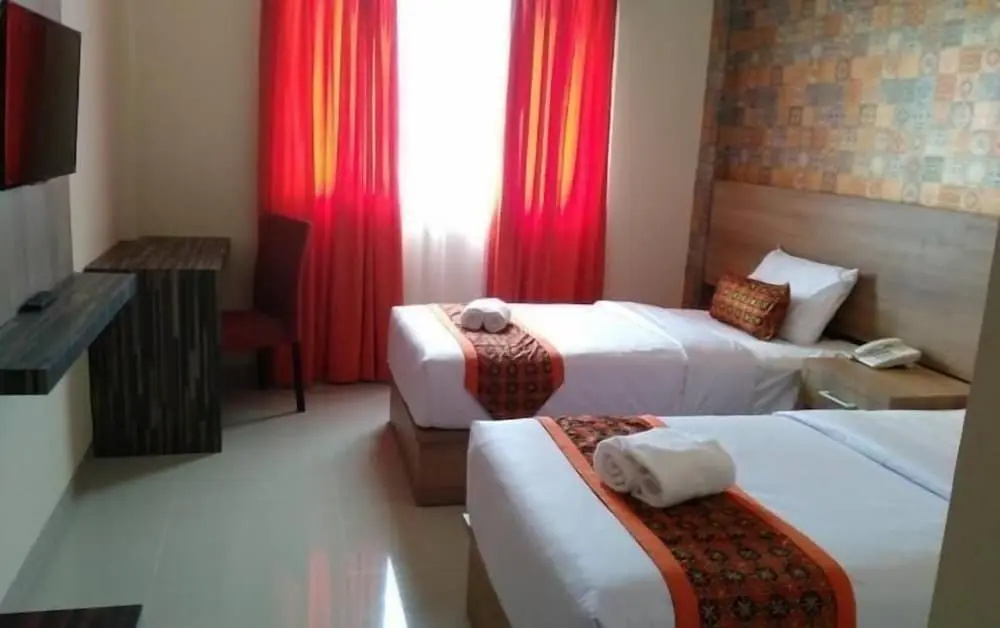 New d'Dhave Hotel - Chambres