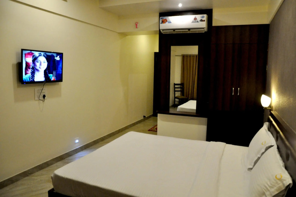 Hotel Gulmohar Pride - Chambres