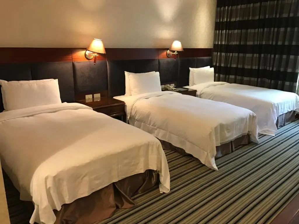 Chia Shih Pao Hotel - Chambres