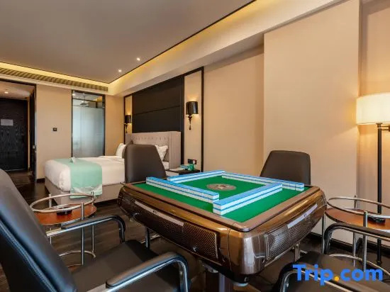 Xinliyuan Hotel - Chambres