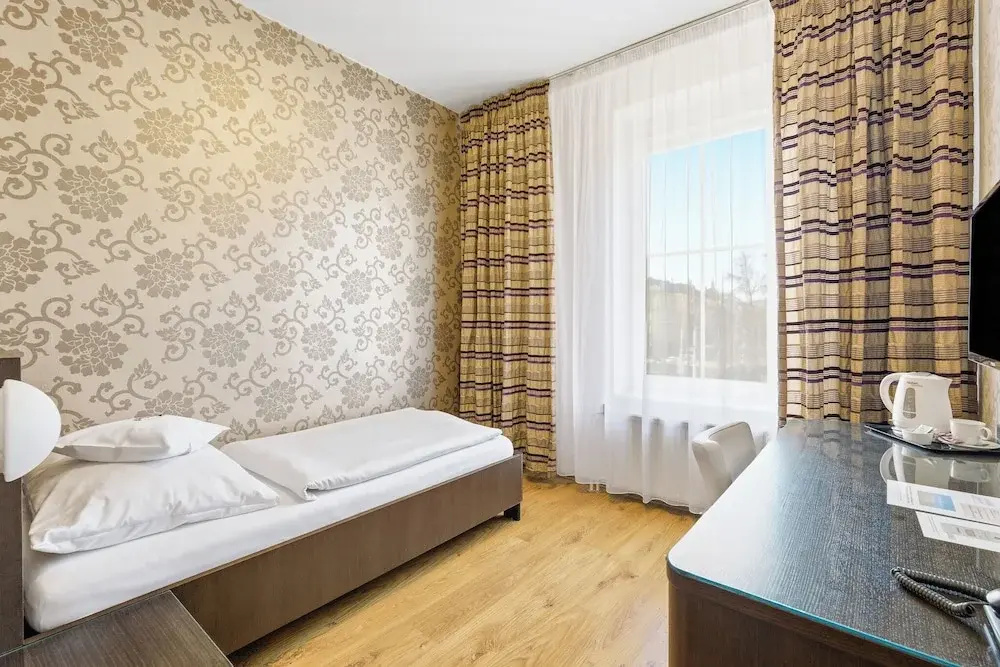 Hotel Trinity - Chambres