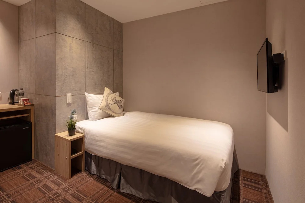 Roaders Hotel Zhonghua - Chambres