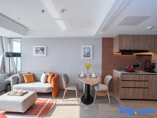 Jingguang Center Apartment Hotel - Chambres