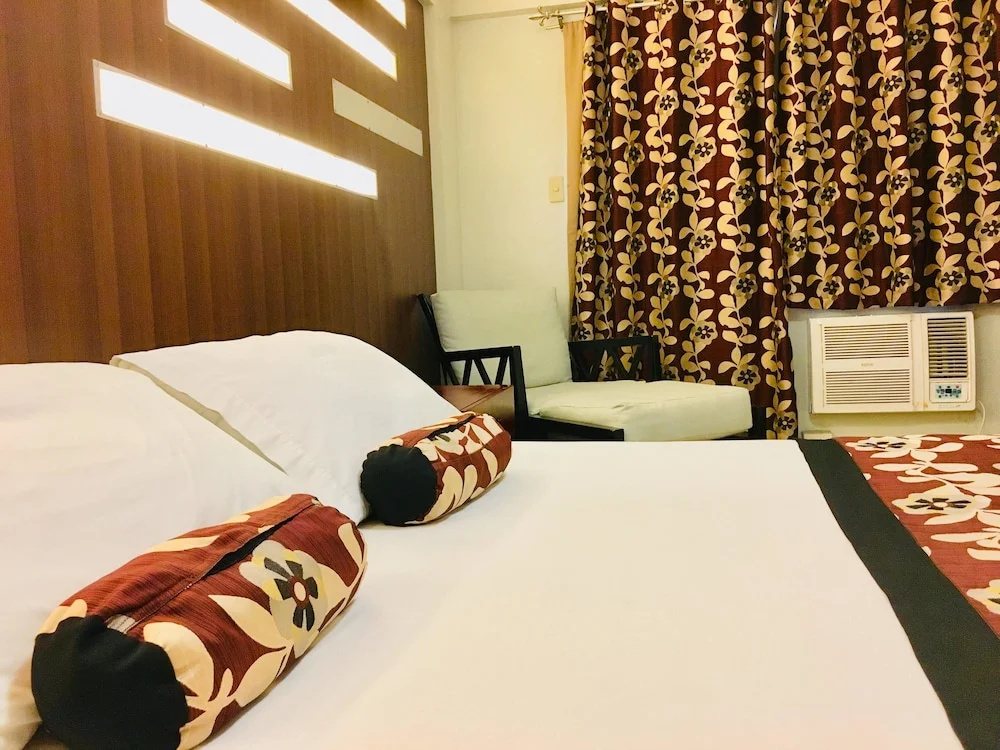 Jupiter Suites - Chambres