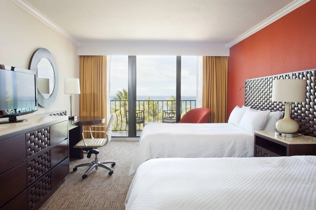 Standard Quadruple room with balcony and oceanfront