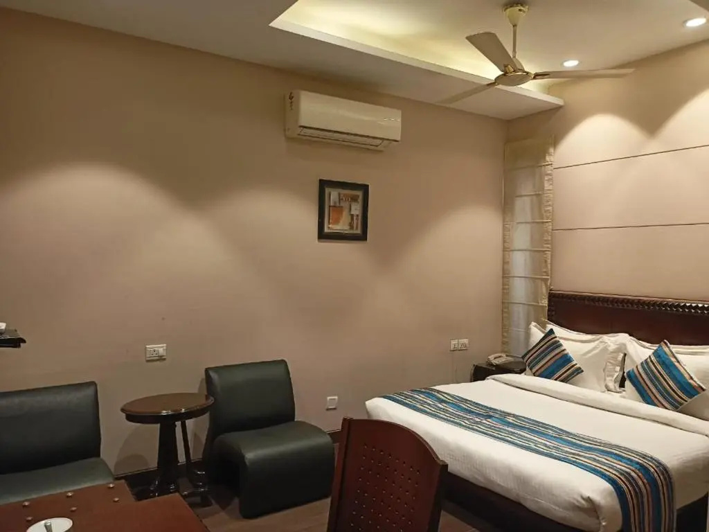 Cosy Grand @Chanakyapuri by The Cosy Hotels. - Chambres