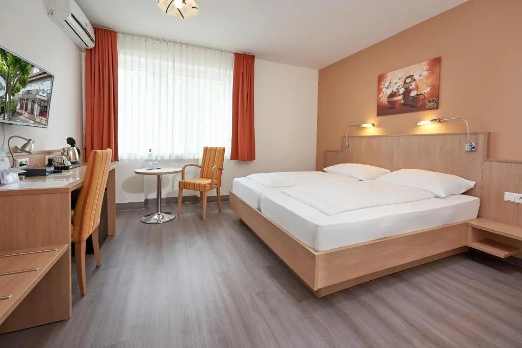Hotel Touristik - Chambres
