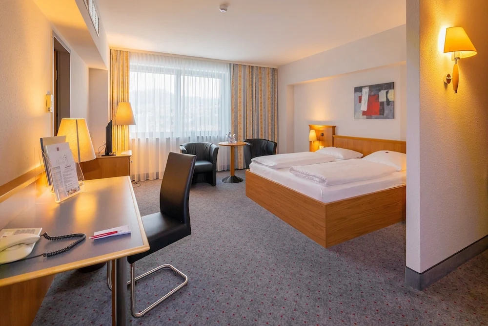 City Hotel am CCS - Chambres