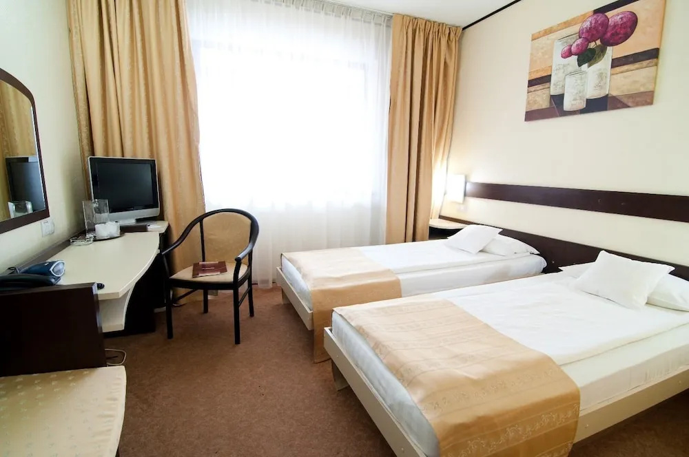 Hotel Rapsodia City Center - Chambres