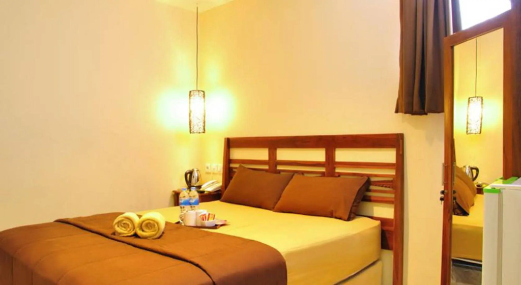Отель Kuta Sari House в Куте