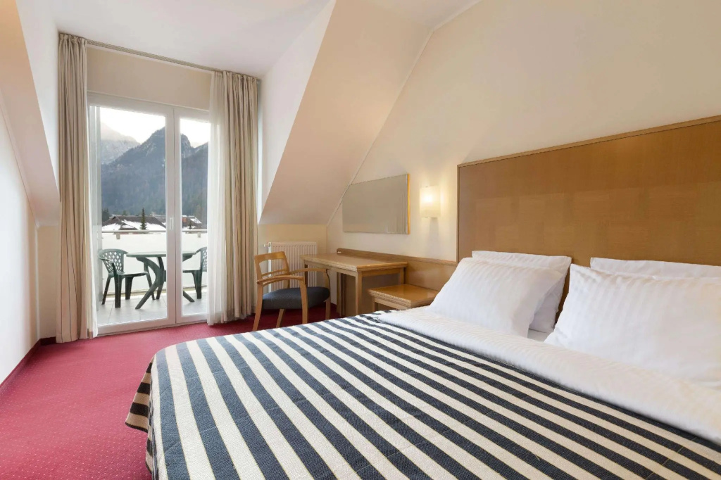Ramada Hotel & Suites by Wyndham Kranjska Gora - Chambres
