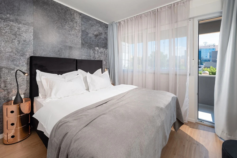 Deluxe Double room with balcony and with city view (full double bed)