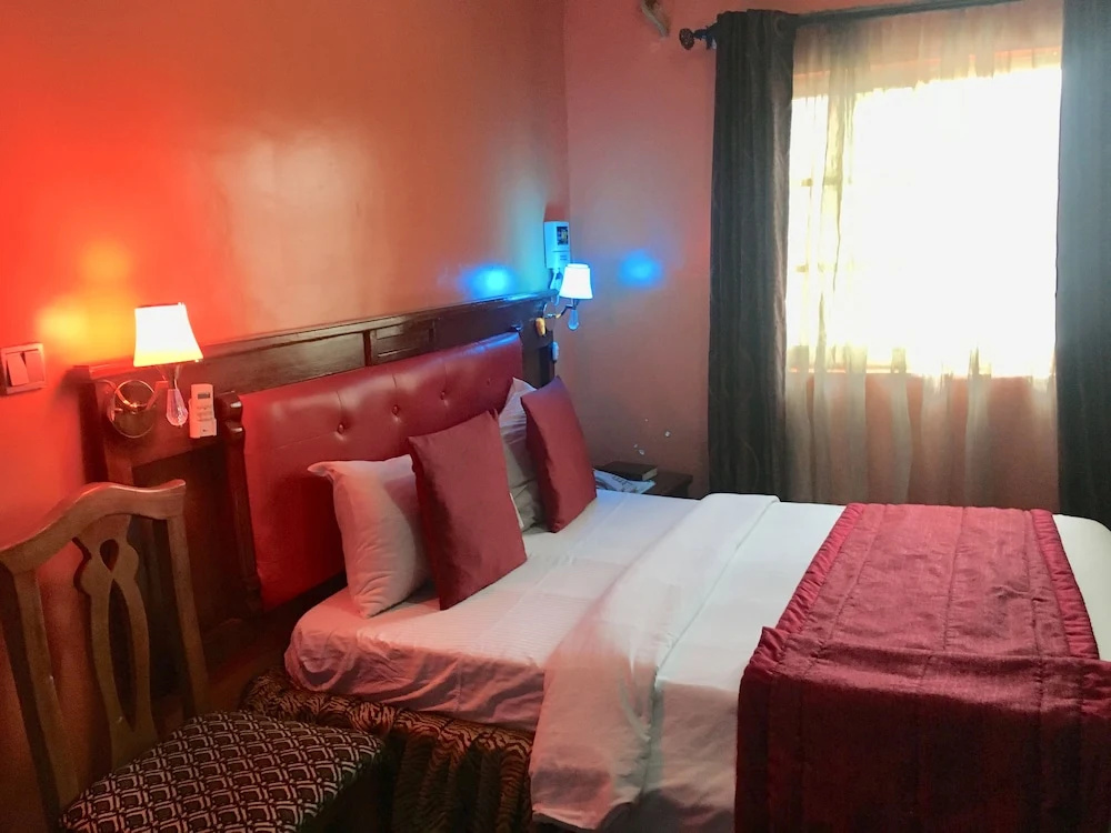 Definite Destiny Hotel - Chambres