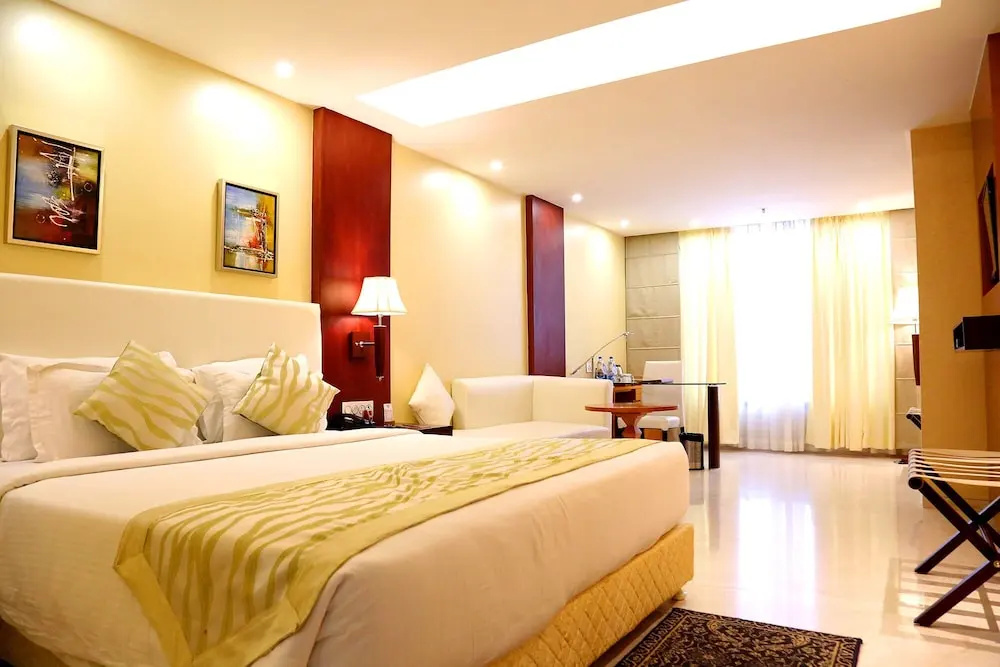 Trinity Grand - Chambres