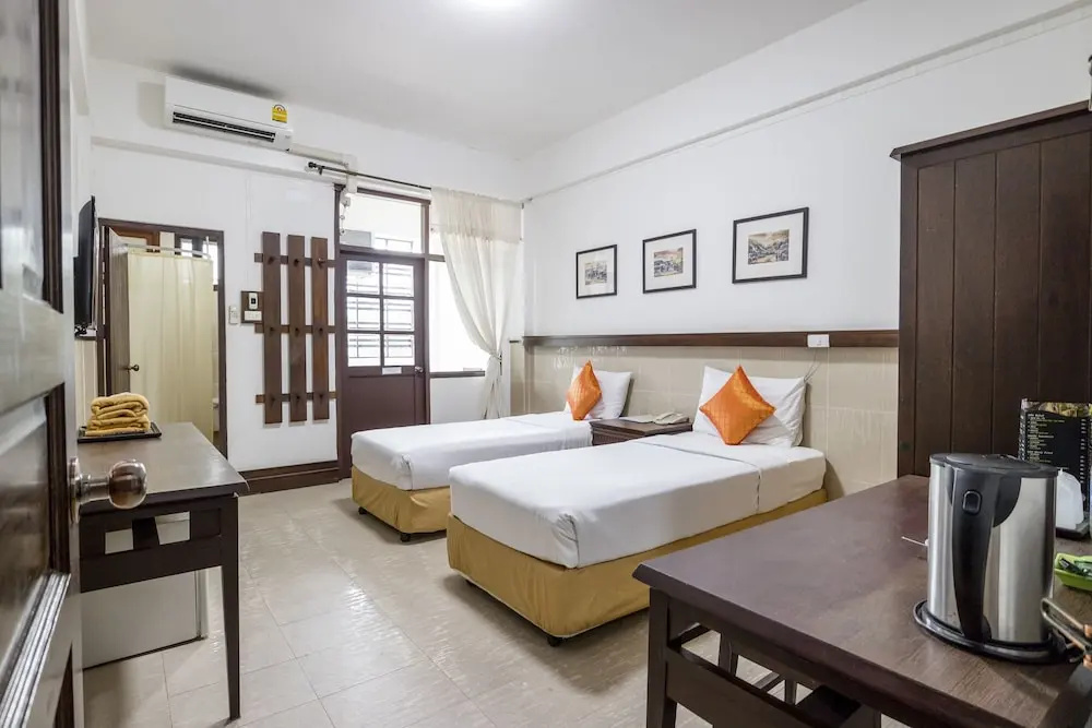 Sakulchai Place Hotel - Chambres