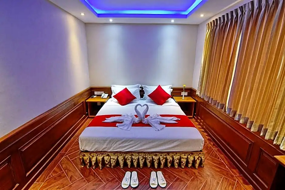 Yadanar Theingi Hotel - Chambres