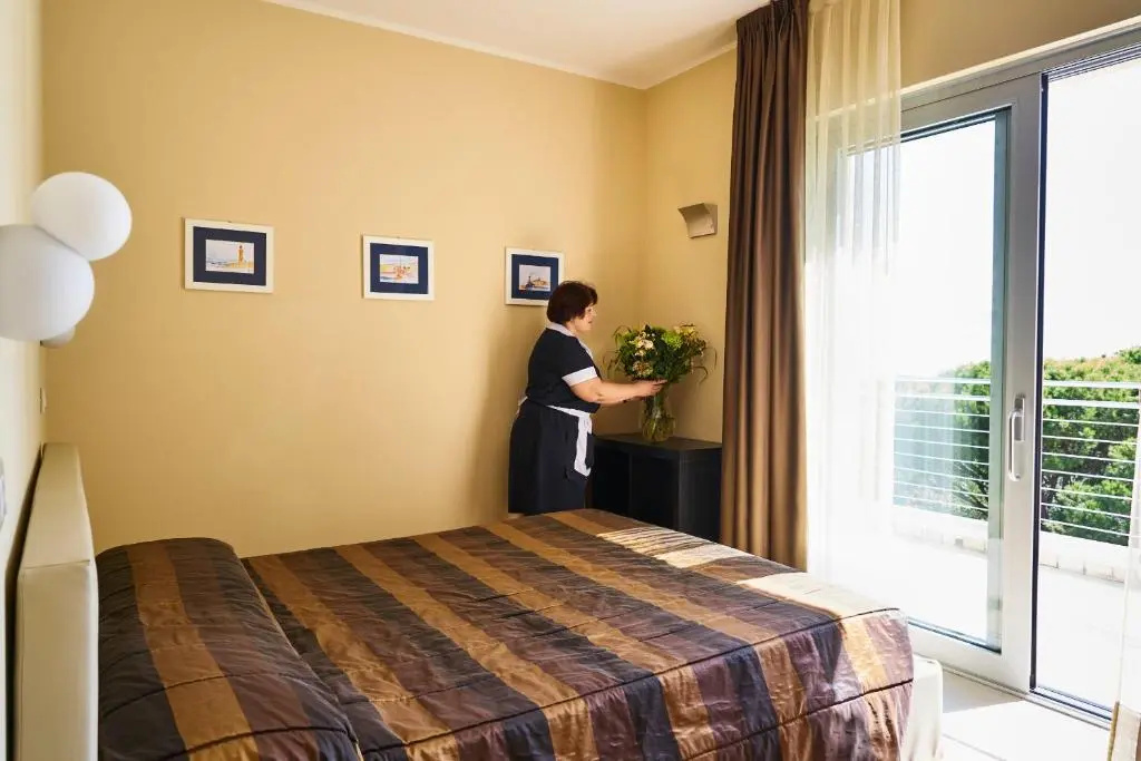 Aparthotel la Pineta - Chambres