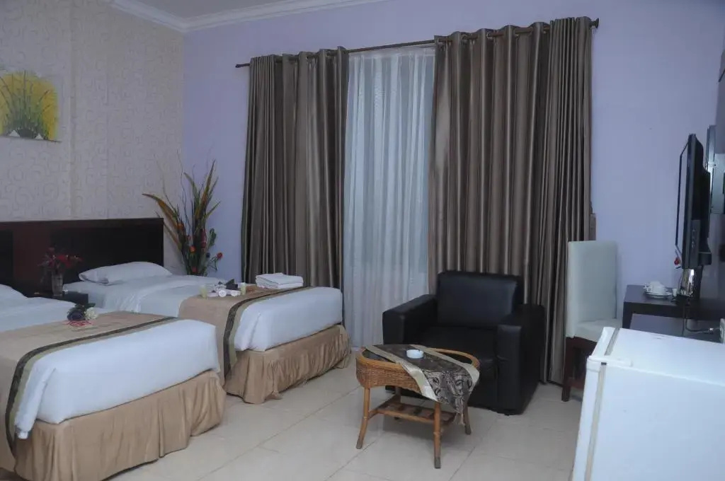 Griya Hotel - Chambres
