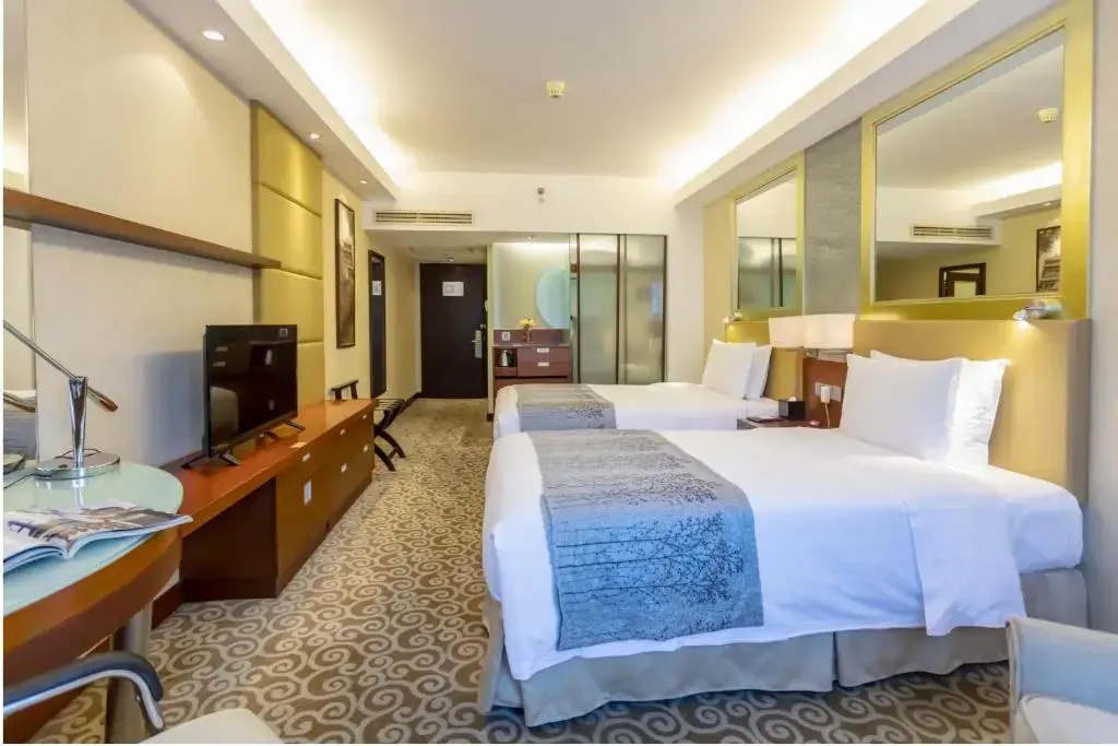 Guo Ji Yi Yuan Hotel - Chambres